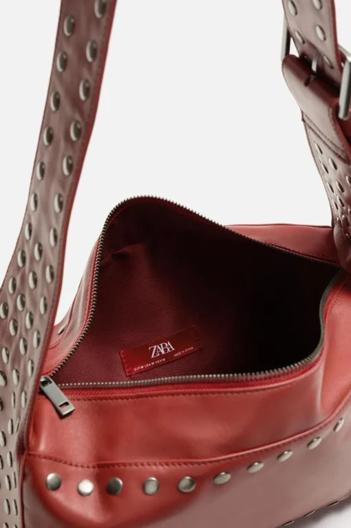 BOLSO PIEL TACHAS X HARRY LAMBERT