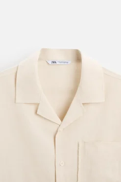 CAMISA BOXY FIT BOLSILLO