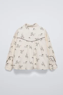 CAMISA ESTAMPADA BOTAS
