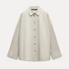 CAMISA OVERSIZE BOTONES LATERALES