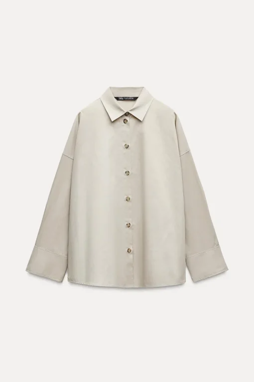 CAMISA OVERSIZE BOTONES LATERALES