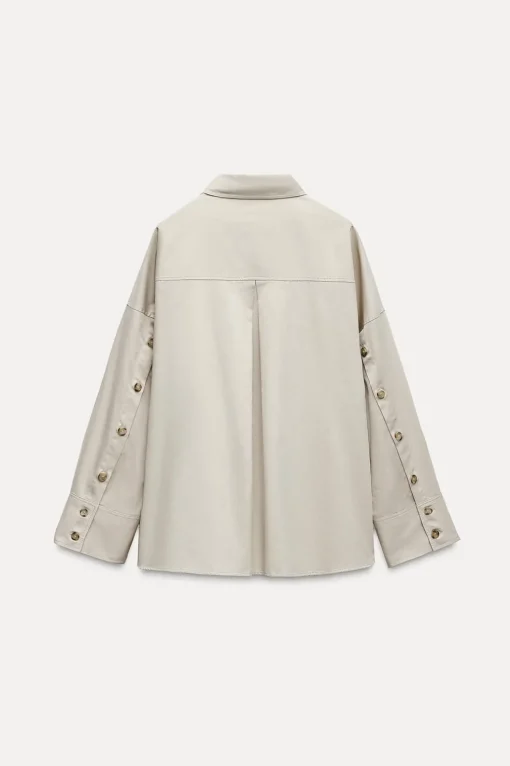 CAMISA OVERSIZE BOTONES LATERALES