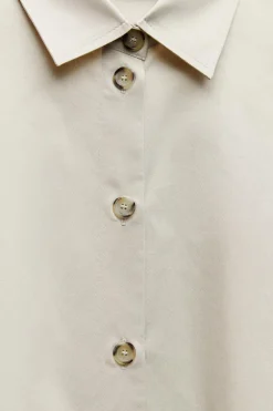 CAMISA OVERSIZE BOTONES LATERALES
