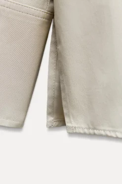 CAMISA OVERSIZE BOTONES LATERALES