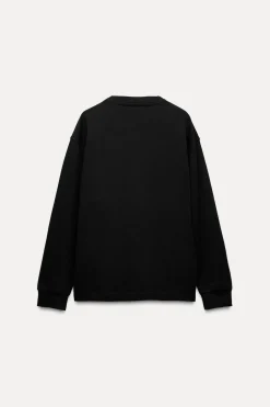 CAMISETA OVERSIZE MANGA LARGA