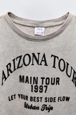 CAMISETA TEXTO FLOCK