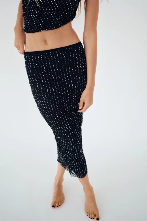 FALDA MIDI ENCAJE JOYAS