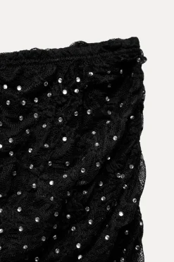 FALDA MIDI ENCAJE JOYAS