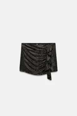 FALDA PANTALÓN VOLANTE BRILLOS
