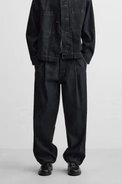 JEANS PLIEGUES CINTURÓN