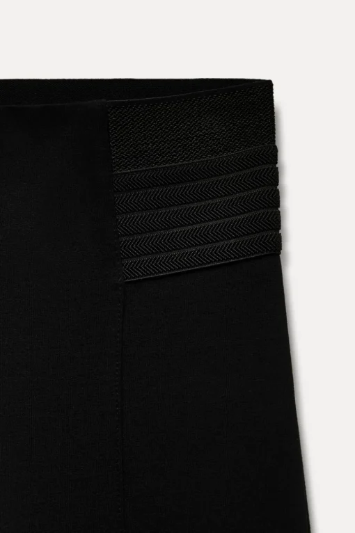 LEGGINGS ELÁSTICOS LATERALES