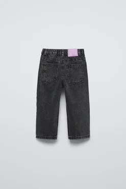 PANTALÓN DENIM TEXTO
