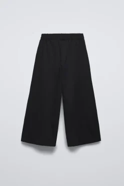 PANTALÓN INTERLOCK BOTONES