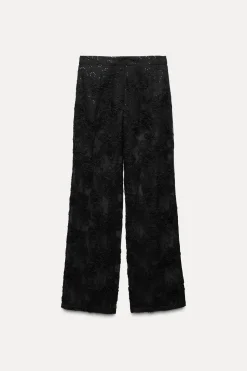 PANTALÓN SEMITRANSPARENTE ESTRUCTURA LENTEJUELAS