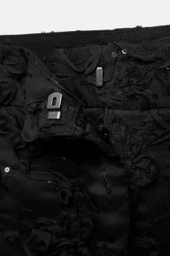PANTALÓN SEMITRANSPARENTE ESTRUCTURA LENTEJUELAS