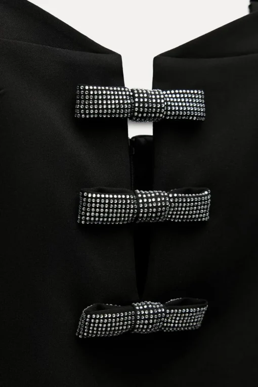 VESTIDO CORTO LAZOS BRILLOS